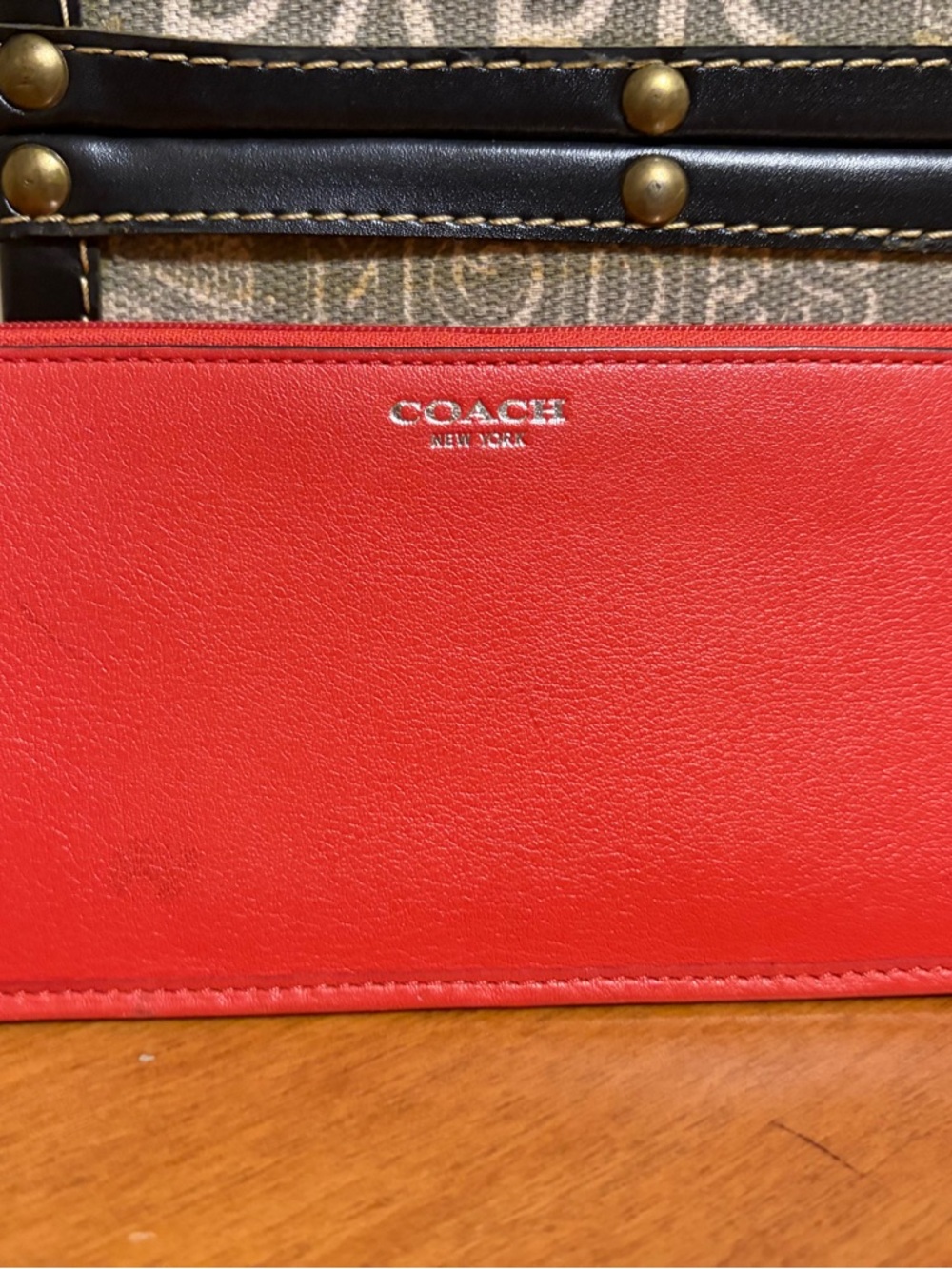 COACH Orange Leather Women's Wallet with Silver Logo